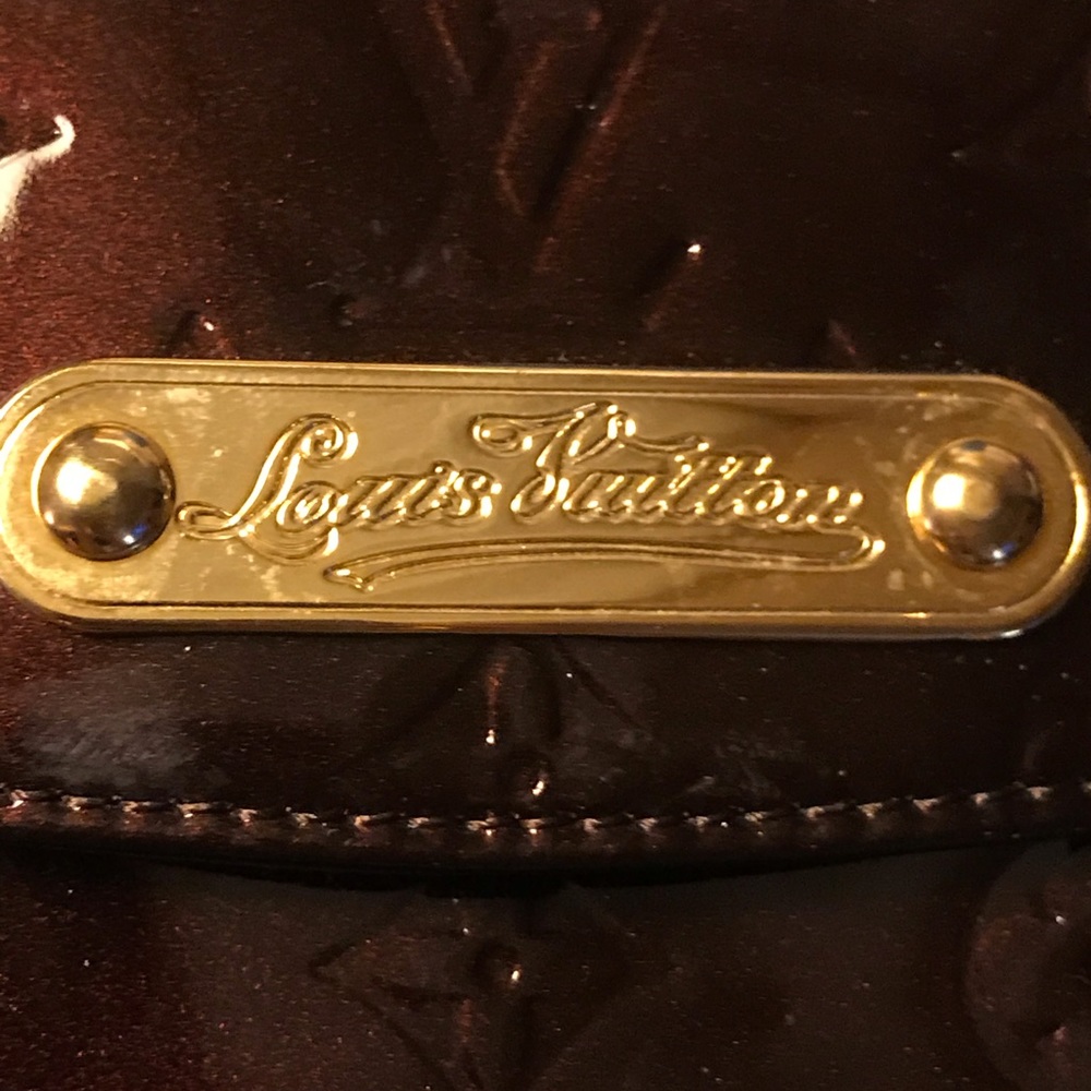 Louis Vuitton - "LV" Clutch -